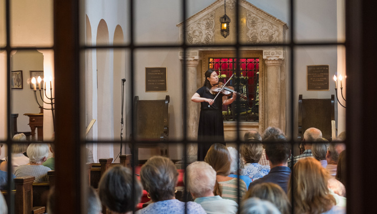 hiefetz concert with woman playing violin