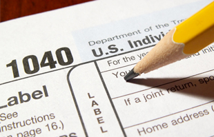 1040 tax form and pencil