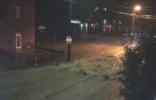 the flood of 2020, water flowing down central over Johnson St.