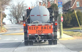 Brine Truck Spraying Winter Weather
